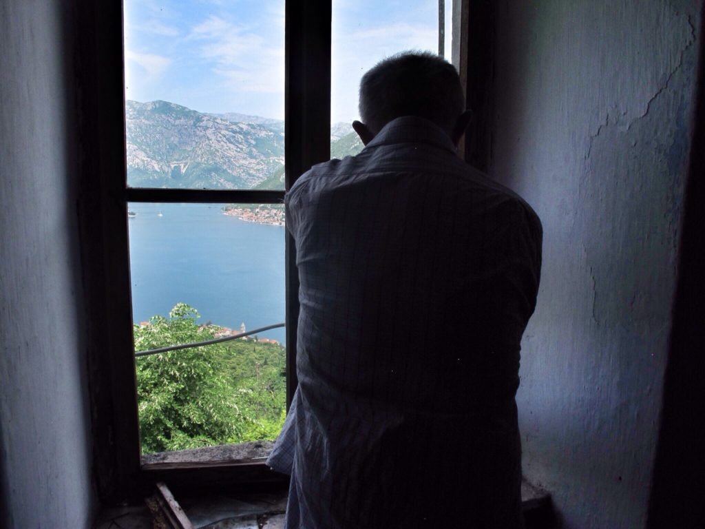 6 Things You Shouldn’t Miss (But Might) in Kotor, Montenegro 15 Brano measuring the windows in Stoliv Montenegro © The Blonde Gypsy