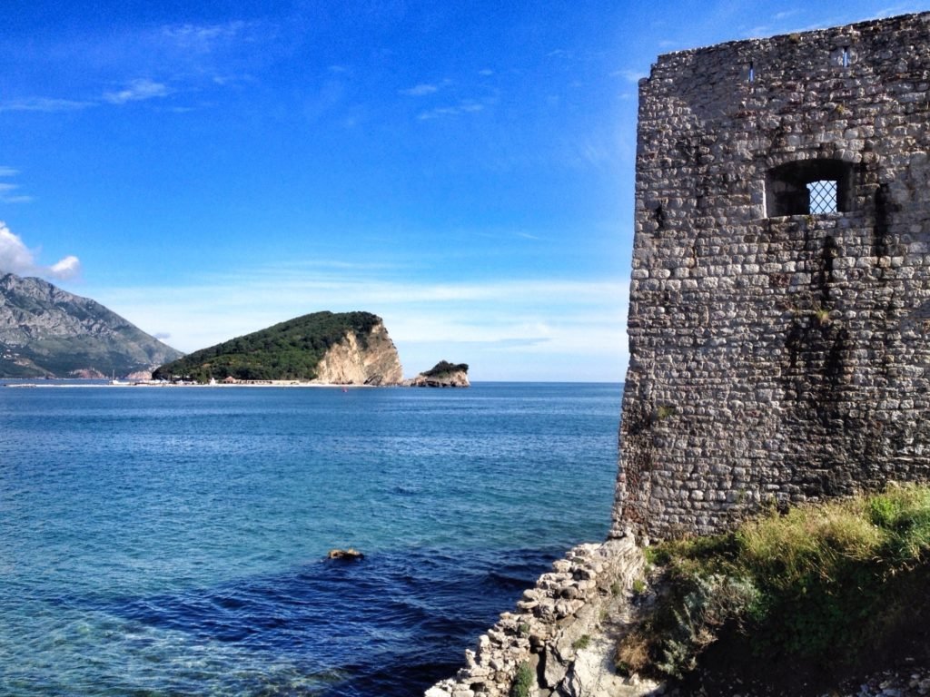Old Town wall and Hawaii in Budva, Montenegro © The Blonde Gypsy