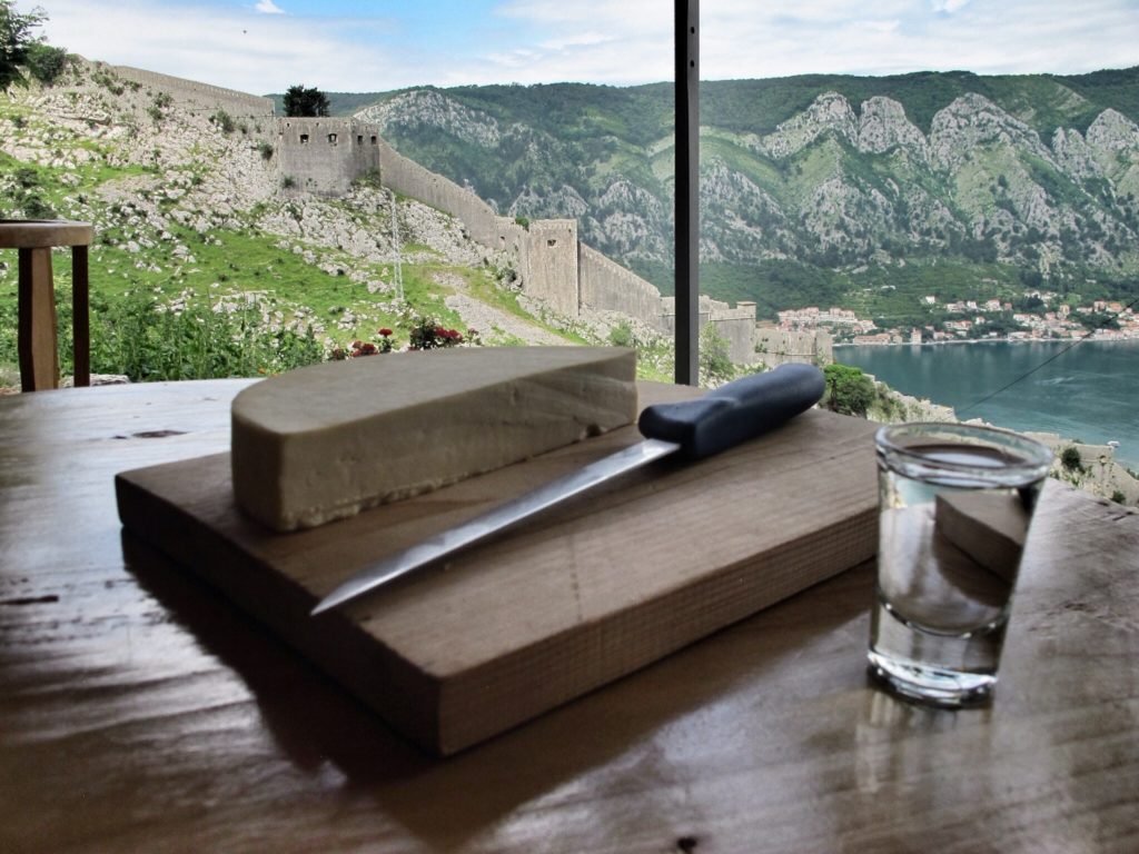 6 Things You Shouldn’t Miss (But Might) in Kotor, Montenegro 9 Rakija and fresh cheese on the way up to Kotor fortress
