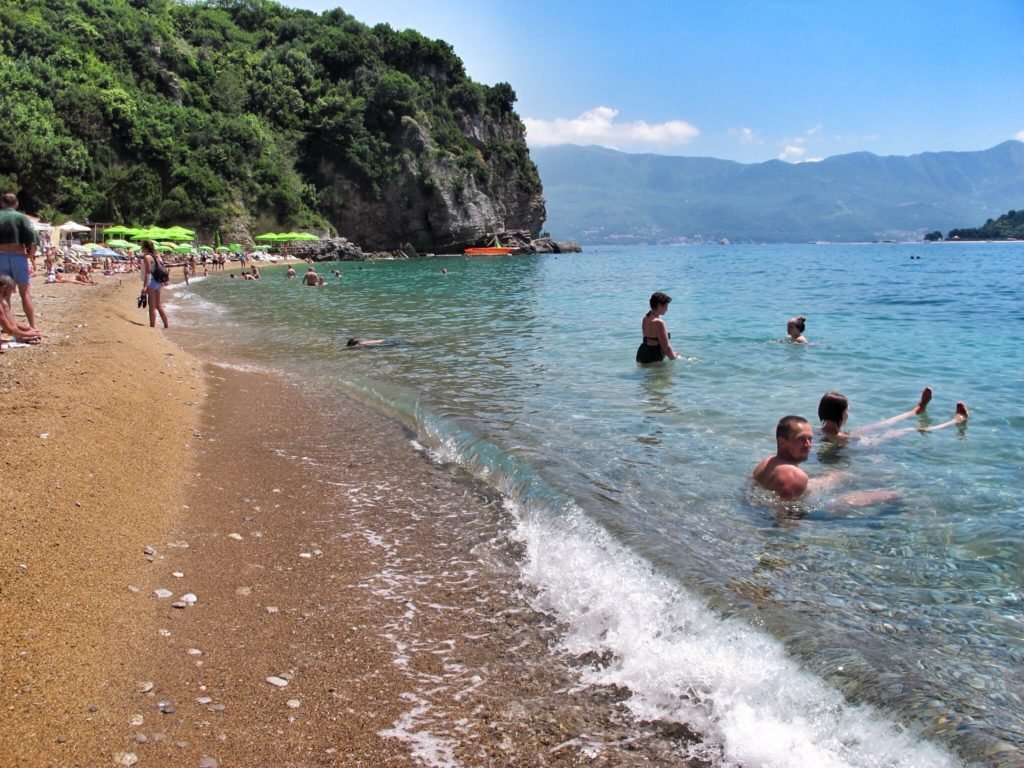 Swimming at Mogren Beach in Budva, Montenegro © The Blonde Gypsy