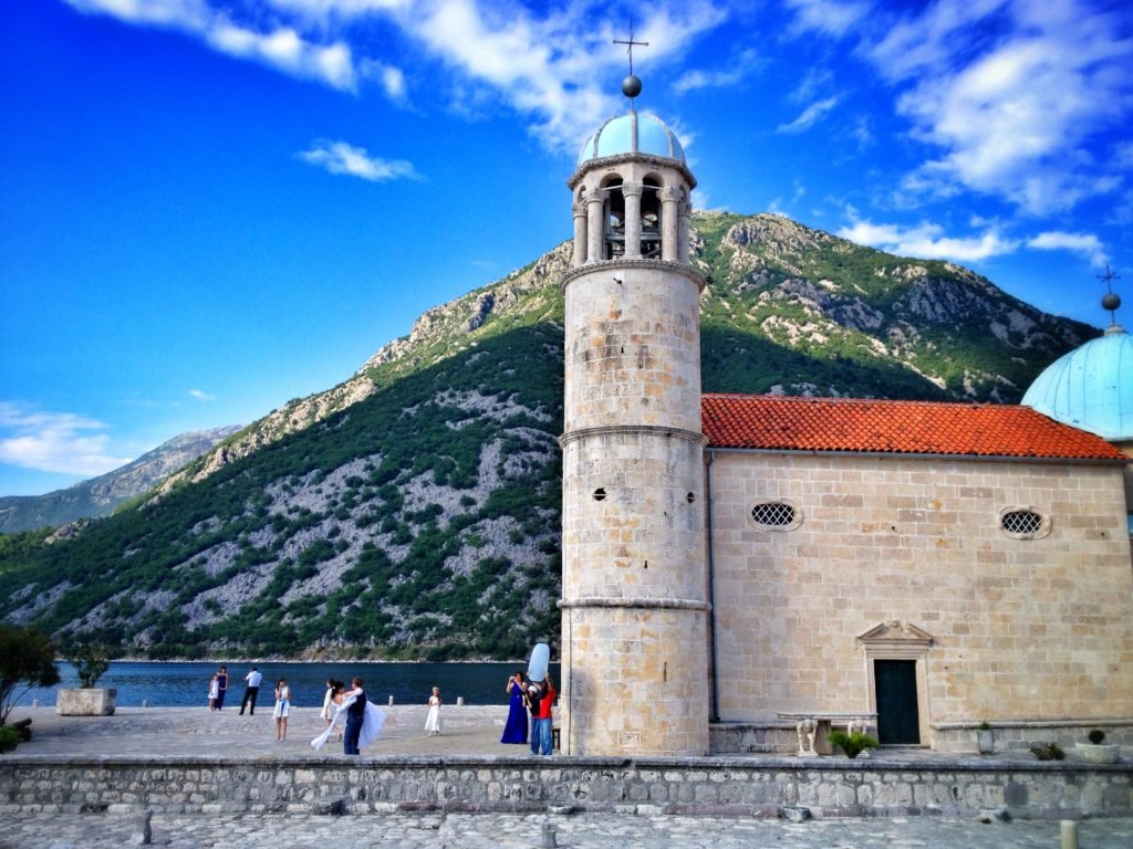 6 Things You Shouldn’t Miss (But Might) in Kotor, Montenegro 22 Wedding on Our Lady of the Rocks Perast Montenegro © The Blonde Gypsy