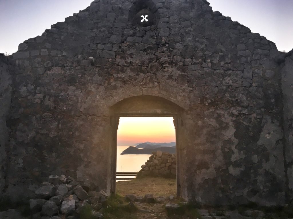 Via Dinarica: From Dubrovnik to the Elaphiti Islands, Croatia 22 Sunset through St. John's Chapel on Lopud Elafiti Islands Dubrovnik Croatia 3 © The Blonde Gypsy