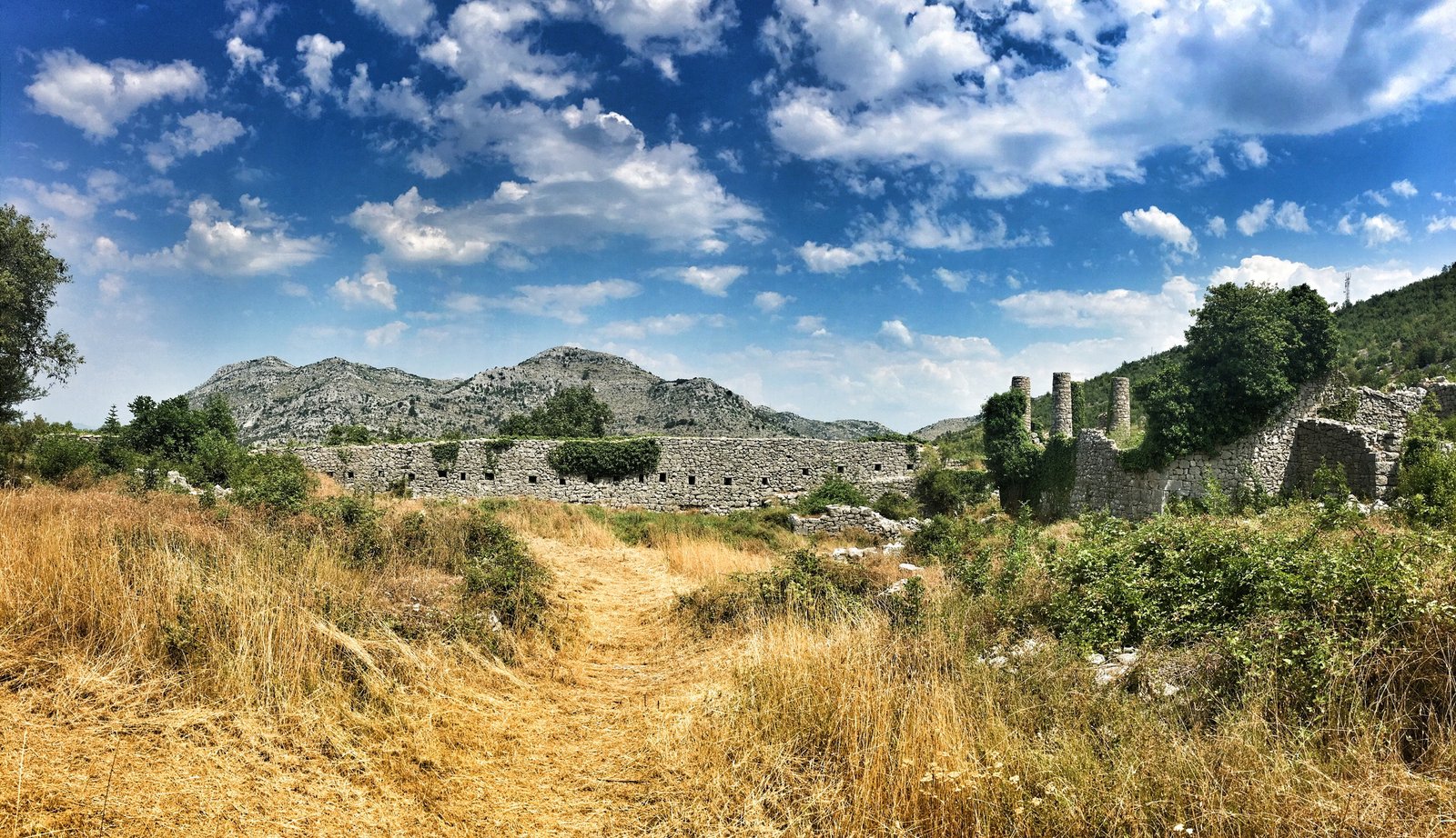 Via Dinarica: Exploring Ravno, Neum, and the Beaches of Bosnia & Herzegovina 27 Outside Hadžibegova Kula Fortress near Hutovo, Bosnia & Herzegovina © The Blonde Gypsy