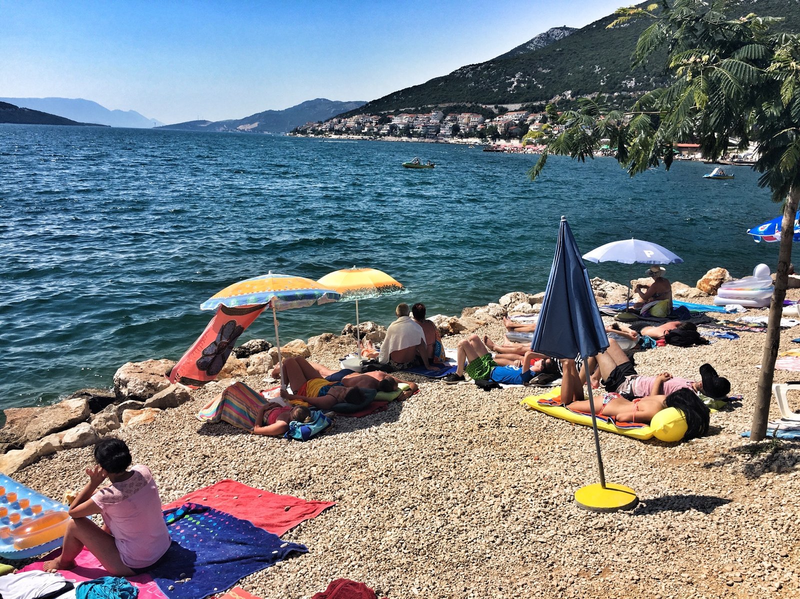 Via Dinarica: Exploring Ravno, Neum, and the Beaches of Bosnia & Herzegovina 3 Sunbathers in Neum, Bosnia & Herzegovina © The Blonde Gypsy