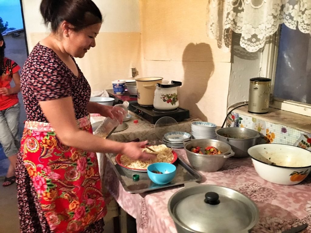 Preparation for Dungan family dinner in Yrdky Kyrgyzstan © larissa olenicoff