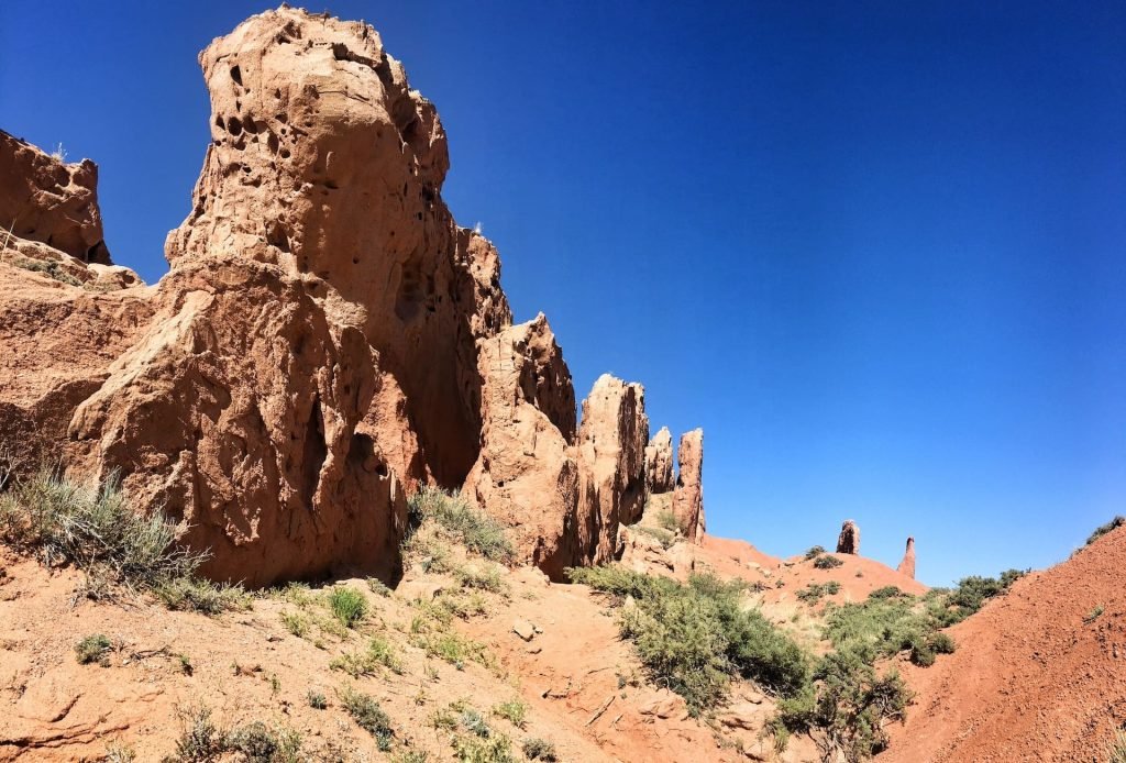 Rock formations at Skazka Canyon on Issyk Kul in Kyrgyzstan © larissa olenicoff