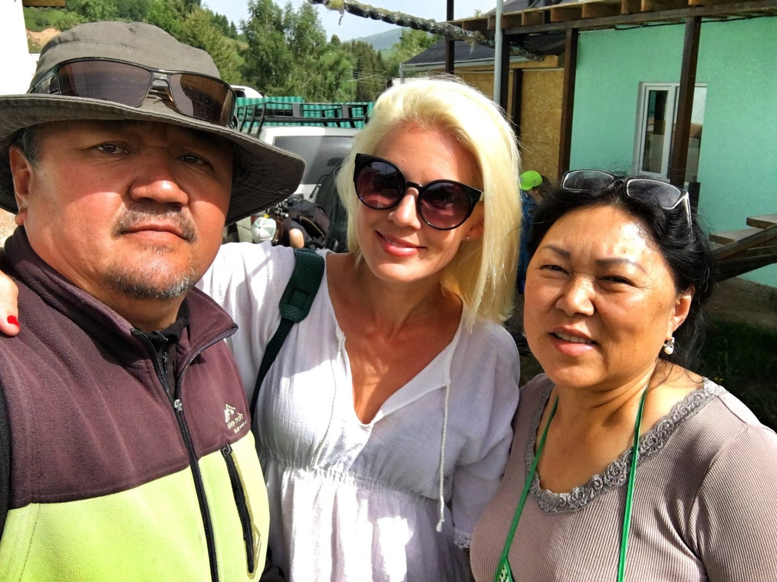 With Emil and Gulmira of Alakol Guesthouse in Jyrgalan Kyrgyzstan © The Blonde Gypsy e1653493863957