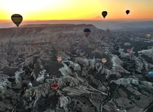 36 Hour Dream Trip to Cappadocia, Turkey 24 View of Volcano Sunrise Hot Air Balloon with Royal Balloon in Cappadocia Turkey © The Blonde Gypsy.jpg