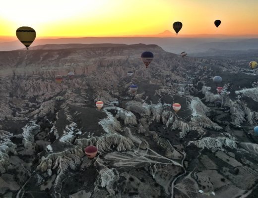 View of Volcano Sunrise Hot Air Balloon with Royal Balloon in Cappadocia Turkey © The Blonde Gypsy.jpg